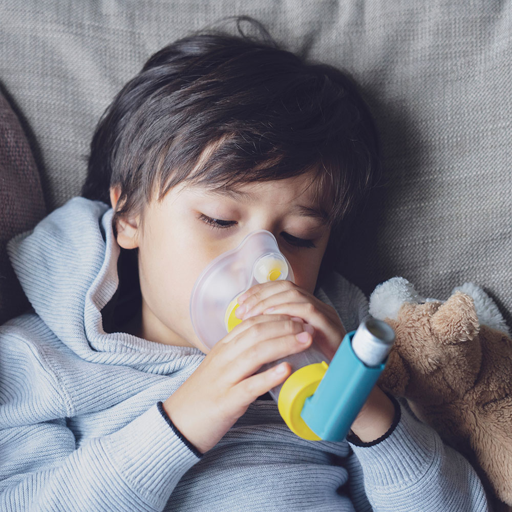 Child with struggling with asthma