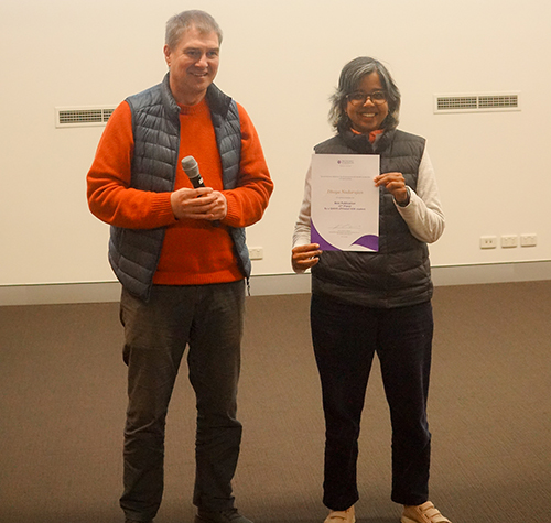 Dhaya Nadarajan receives her second place certificate